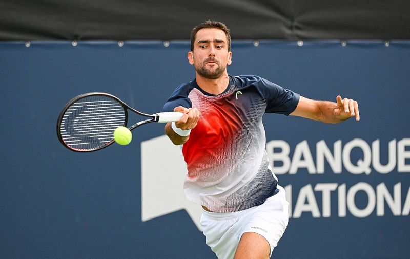 MONTREAL, QC - AUGUST 10: Marin Cilic CRO returns the ball during second round ATP, Tennis Herren National Bank Open match on August 10, 2022 at IGA Stadium in Montreal, QC Photo by David Kirouac/Icon Sportswire TENNIS: AUG 10 National Bank Open Icon220810085