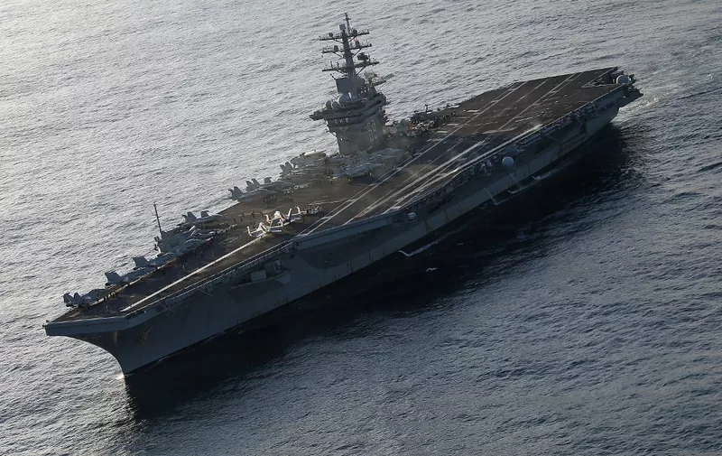 The USS Eisenhower is shown off the coast of Virginia, December 10, 2015 in the Atlantic Ocean. US Secretary Secretary of Defense Ash Carter visited the carrier with India's Minister of Defense Manohar Parrikar to demonstrate US Navy aircraft carrier flight operations.   AFP PHOTO/ MARK WILSON/ POOL (Photo by MARK WILSON / POOL / AFP)