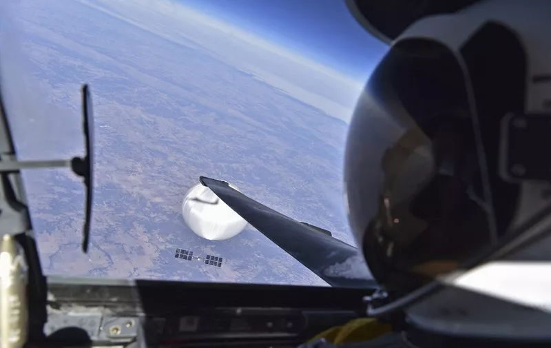 IN FLIGHT - FEBRUARY 3: In this handout image provided by the Department of Defense, a U.S. Air Force U-2 pilot looks down at the suspected Chinese surveillance balloon on February 3, 2023 as it hovers over the Central Continental United States. Recovery efforts began shortly after the balloon was downed.   U.S. Department of Defense via Getty Images/AFP (Photo by Handout / GETTY IMAGES NORTH AMERICA / Getty Images via AFP)