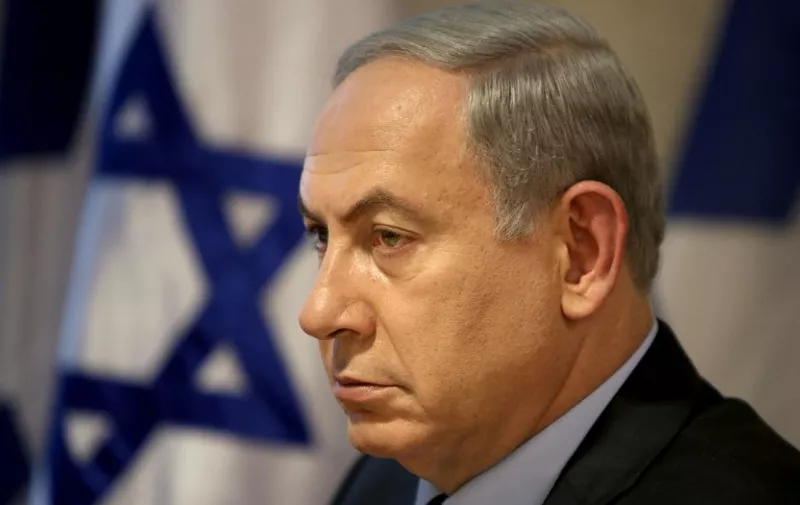 Israeli Prime Minister Benjamin Netanyahu looks on during a press conference at the foreign ministry in Jerusalem on October 15, 2015. Netanyahu reiterated his willingness to meet Palestinian leader Mahmud Abbas, while accusing him of inciting and encouraging violence, after a wave of Palestinian attacks that have shaken the country. AFP PHOTO / GALI TIBBON