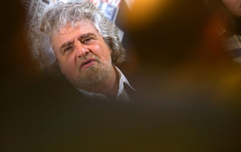 Five Star Movement leader Beppe Grillo gives a press conference on January 23, 2014 in Rome.  AFP PHOTO / GABRIEL BOUYS / AFP PHOTO / GABRIEL BOUYS