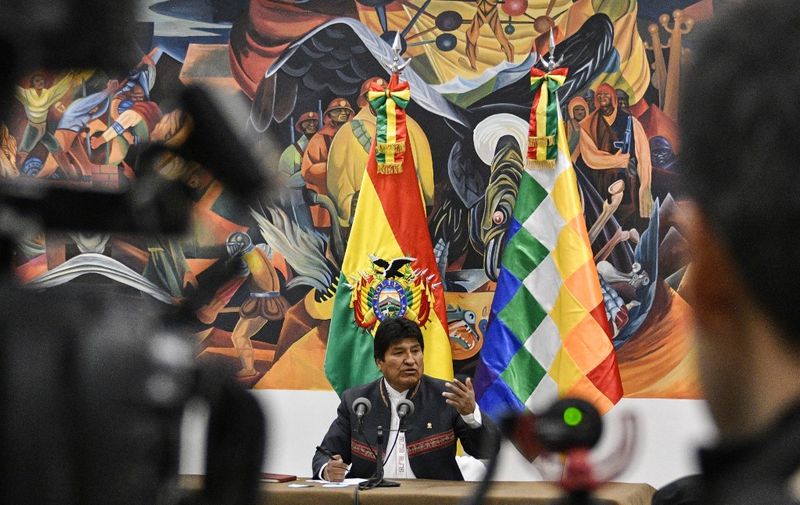 Bolivia's President and presidential candidate Evo Morales speaks during a press conference at the Casa Grande del Pueblo (Great House of the People) in La Paz, on October 24, 2019. - Evo Morales said Thursday he was open to holding a second round run-off in Bolivia's presidential elections, despite claiming outright victory over his rival Carlos Mesa. (Photo by AIZAR RALDES / AFP)