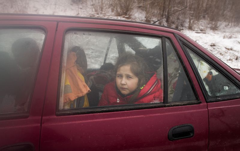 Exclusive - Ukrainian refugees at the Kroscienko border crossing in the Lesser Carpathians at the south of Poland. People in cars wait for days, people on foot wait 6 to 8 hours in ukrainian side. Kroscienko, Ukraine, on February 28, 2022.,Image: 665486980, License: Rights-managed, Restrictions: , Model Release: no, Credit line: Profimedia