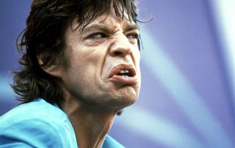 Mick Jagger, lead singer for the rock group the "Rolling Stones" performs with his band in the Ullevi Stadium in Gothenburg, Sweden, 19 June 1982, before some 112 177 spectators.   (FILM) AFP PHOTO