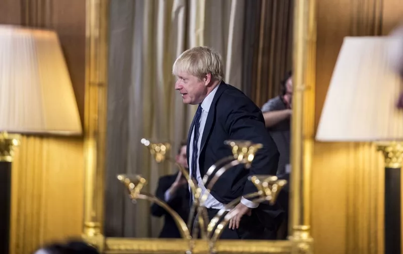 Britain's Prime Minister Boris Johnson attends an event where he took questions from young people aged 9-14 inside 10 Downing Street in London on August 30, 2019 ahead of an education announcement. - British Prime Minister Boris Johnson on August 30 warned any attempt by MPs next week to stop Brexit or delay it beyond October 31 would do "lasting damage" to public trust in politics. (Photo by JEREMY SELWYN / POOL / AFP)