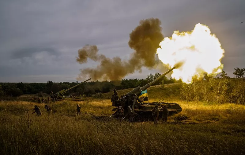 Ukrainian artillery unit fires with a 2S7-Pion, a self-propelled gun, at a position near a frontline in Kharkiv region on August 26, 2022, amid the Russian invasion of Ukraine. (Photo by Ihor THACHEV / AFP)