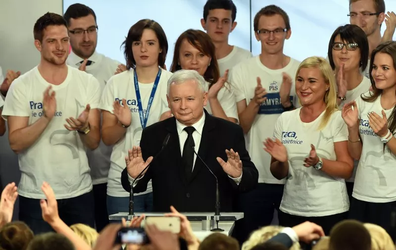 Jaroslaw Kaczynski, leader of the conservative opposition Law and Justice (PiS) speaks at the party's headquarters in Warsaw afte rexit poll results were announced on October 25, 2015. Poland's conservative Law and Justice (PiS) party  won an absolute majority in the general election, public broadcaster TVP projected, a victory that would end eight years of centrist rule. An exit poll showed the PiS picked up 242 out of 460 seats in the lower house of parliament, ousting the governing Civic Platform (PO) liberals who had 133 seats.announcing the first unofficial results of the general election in Poland on October 25, 2015. AFP PHOTO/JANEK SKARZYNSKI