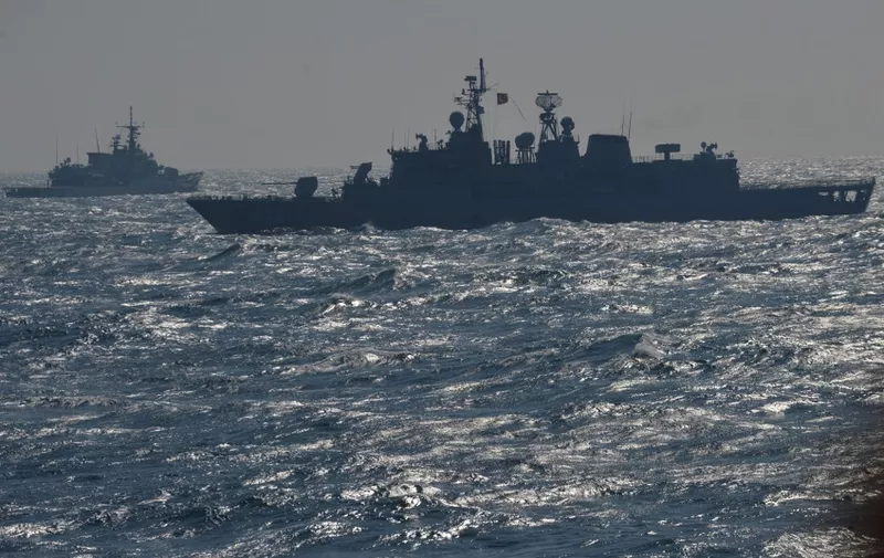 War ships of the NATO Standing Maritime Group-2 take part in a military drill on the Black Sea, 60km from Constanta city March 16, 2015. NATO Standing Maritime Group-2 (SNMG-2) is one of four groups multinational naval NATO forces and is headed by US Admiral Brad Williamson. The group consists of four frigates from Canada, Turkey, Italy and Romania, a cruiser (US ship commander) and an auxiliary vessel from Germany. AFP PHOTO DANIEL MIHAILESCU (Photo by DANIEL MIHAILESCU / AFP)