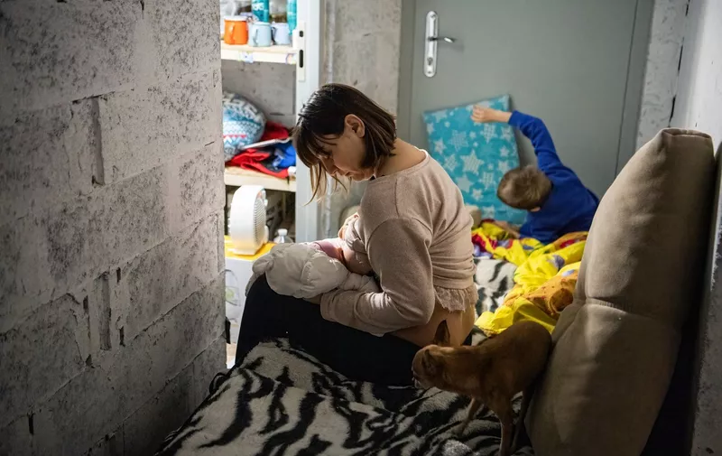 Natalia breastfeeds her three-day-old baby next to her four-year-old son in a basement near the blast that destroyed parts of a shopping mall in Kyiv. Residents of Kyiv have been sheltering in basements and bunkers since Russia began invading Ukraine on Feb. 24, 2022.
Residents sheltering in basements and bunkers since Russia began invading Ukraine - 21 Mar 2022,Image: 672301358, License: Rights-managed, Restrictions: , Model Release: no, Credit line: Profimedia