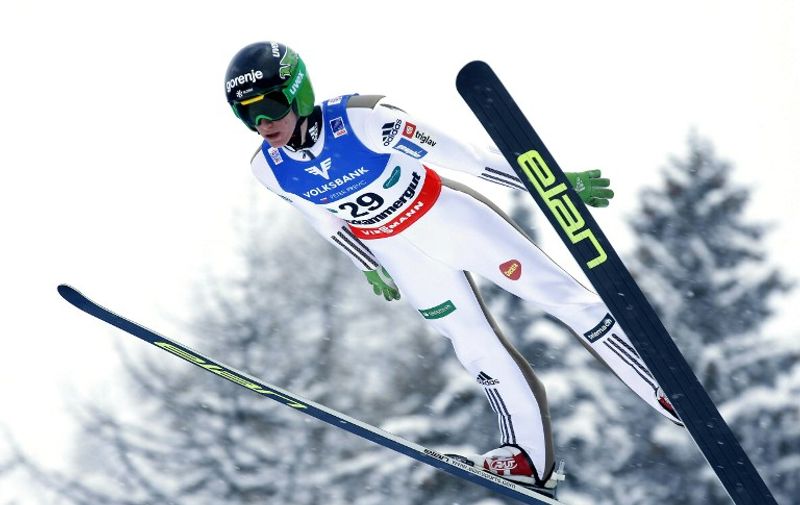 Slovenia's Peter Prevc competes during a trial jump at of the Ski Flying World Championships at Kulm, Bad Mitterndorf, Austria on January 16, 2016.  / AFP / APA / ERWIN SCHERIAU / Austria OUT