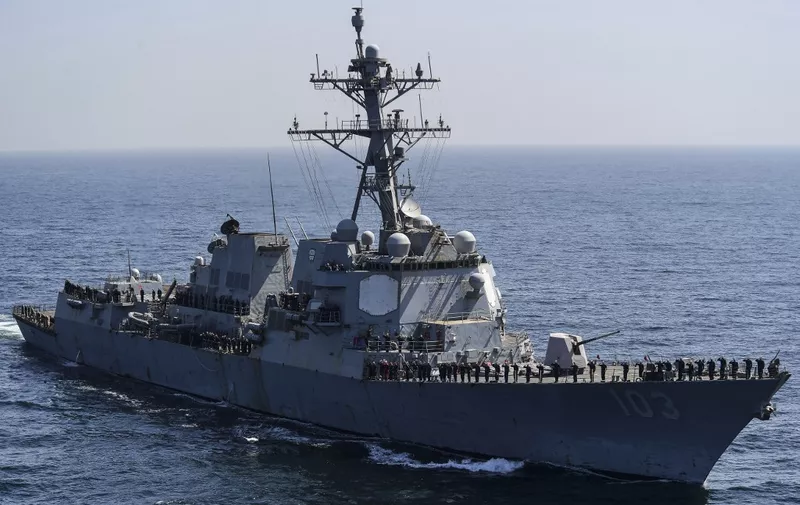 US Naval Ship USS Truxtun takes part in the multinational naval exercise 'AMAN-23' in the Arabian Sea near Pakistan's port city of Karachi on February 13, 2023, as more than 50 countries participating with ships and observers. (Photo by Asif HASSAN / AFP)