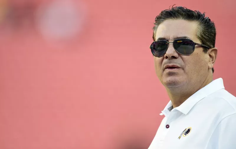 (FILES) In this file photo Washington Redskins owner Dan Snyder stands on the field before a preseason game between the Baltimore Ravens and Redskins at FedExField on August 29, 2019 in Landover, Maryland. - The NFL's Washington Redskins will announce on July 13, 2020 they are changing their name, US media reported, following pressure from sponsors over a moniker widely criticized as a racist slur against Native Americans. Team owner Dan Snyder had long resisted calls to change the name, but came under renewed scrutiny as the United States saw massive rallies and campaigns erupt against racial injustice following the death in May of George Floyd, an unarmed African American man in police custody. (Photo by Patrick McDermott / GETTY IMAGES NORTH AMERICA / AFP)
