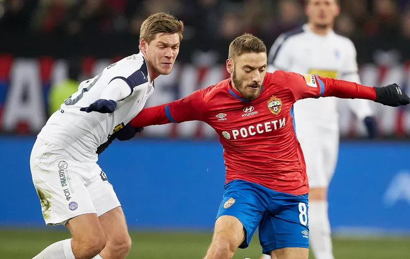 MOSCOW, RUSSIA - NOVEMBER 24: Nikola Vlasic of PFC CSKA Moscow and Artyom Timofeyev of FC Krylia Sovetov Samara vie for the ball during the Russian Football League match between PFC CSKA Moscow and FC Krylia Sovetov Samara at Arena CSKA stadium on November 24, 2019 in Moscow, Russia. (Photo by Oleg Nikishin/Epsilon/Getty Images)