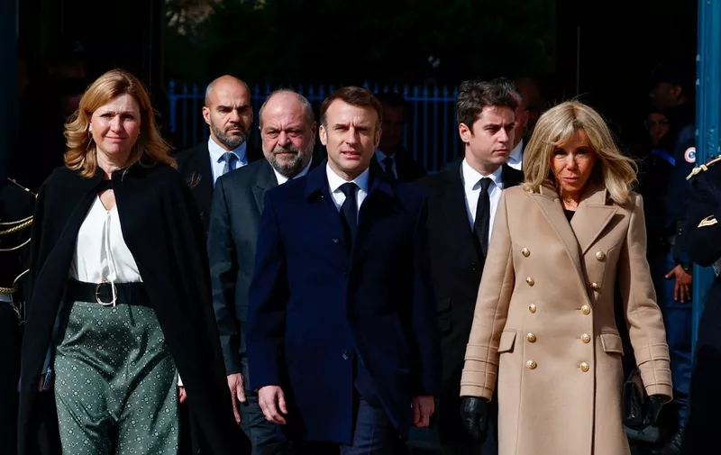 French President Emmanuel Macron (C), his wife Brigitte Macron (R), National assembly president Yael Braun-Pivet (L), Justice Minister Eric Dupond-Moretti (3rdL) and Prime Minister Gabriel Attal (2ndR) arrive for a ceremony to seal the right to abortion in the Constitution as part of the 2024 international Women's Day in Paris on March 8, 2024. (Photo by Gonzalo Fuentes / POOL / AFP)