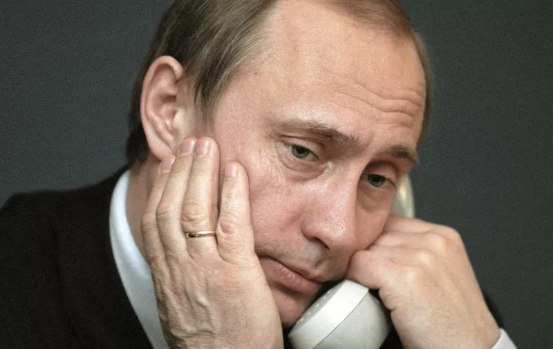 21472 09.02.2000 Acting Russian President Vladimir Putin talks to Komsomolskaya Pravda readers on a telephone hot line.,Image: 596731407, License: Rights-managed, Restrictions: , Model Release: no, Credit line: Profimedia