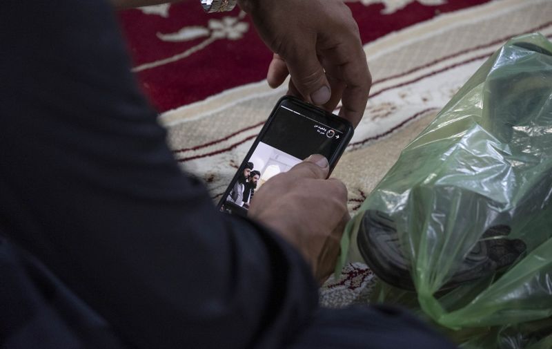 An Afghan refugee man looks at an image of members of the Taliban on his smartphone screen while attending a Moharram mourning ceremony for praying for peace and Afghanistan, at a hussainiyah in Varamin county in Tehran Province, August 20, 2021.
Afghan Refugees Pray For Peace And Afghanistan In The Muharram Mourning Ceremony In Tehran, Iran - 21 Aug 2021,Image: 628166063, License: Rights-managed, Restrictions: , Model Release: no, Credit line: Profimedia