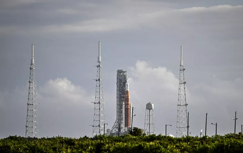The Artemis I unmanned lunar rocket sits on the launch pad at the Kennedy Space Center in Cape Canaveral, Florida, on August 29, 2022. - NASA called off the test flight on Monday of its largest-ever Moon rocket because of a temperature issue with one of the four giant engines. (Photo by CHANDAN KHANNA / AFP)