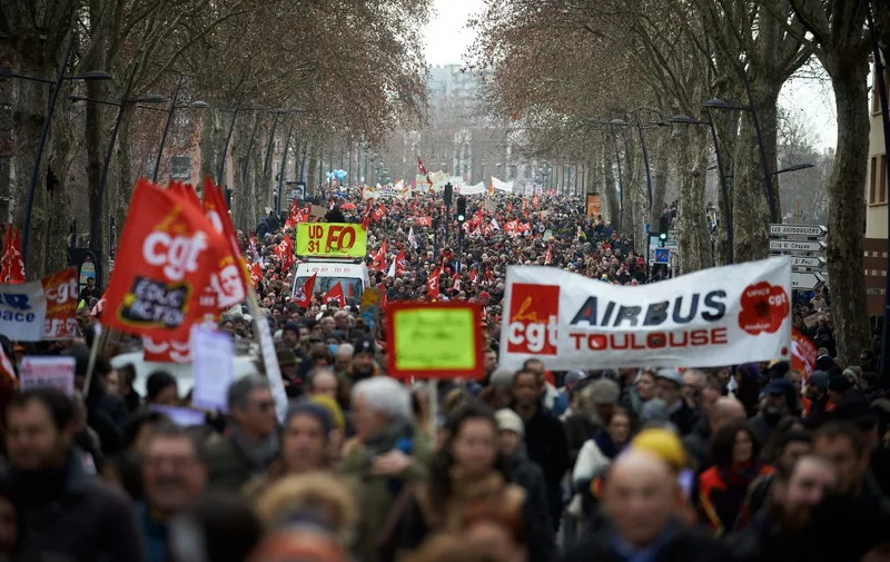 More than 60,000 people (80,000 for the unions) are taking to the streets in Toulouse for the second time in two weeks to protest against the planned reform of pensions and retirement age. France's labour unions have made a joint call for a new day of major strike action and protests across France against plans by President Emmanuel Macron's government to reform the pension system and raise the retirement age to 64 from 62, a move opinion polls show is opposed by a vast majority (93%) of workers already facing a cost-of-living crisis. Nearly all sectors unions have called for this strike and protest: mining and energy, health, schooling sector, transportation, truck drivers, refining workers, bank workers, etc. The retirement age would be raised to 64 years (for 43 years of continued work) and the pensions would be lower, especially for women, 'short careers' and low wages people. The COR (Counsel of Pension Guidance), which depends on the Prime Minister's Office directly, said in its latest report on September 2022 that it sees no need to reform the pension system as its share in the French GDP will remain steady at least until 2070. Toulouse, France, January 31st 2023. (Photo by Alain Pitton/NurPhoto) (Photo by Alain Pitton / NurPhoto / NurPhoto via AFP)