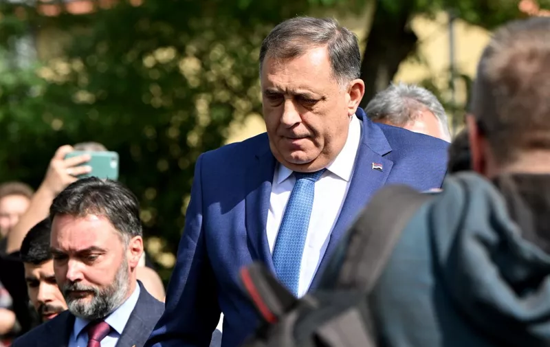 Bosnian Serb leader Milorad Dodik (C) leaves the court of Bosnia-Herzegovina in Sarajevo on October 16, 2023. Dodik refused Monday to enter a plea to charges of refusing to heed rulings made by an international peace overseer in Bosnia, saying he did not understand them. Dodik refused on October 16, 2023, to enter a plea to charges of refusing to heed rulings made by an international peace overseer in Bosnia, saying he did not understand them. Dodik was indicted last month with passing laws that would allow the Bosnian Serb entity to bypass or ignore decisions made by German diplomat Christian Schmidt, who is the top international envoy to the country. (Photo by Elvis BARUKCIC / AFP)
