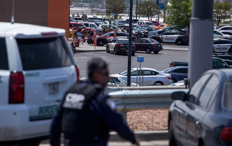 Law enforcement agencies respond to an active shooter at a Wal-Mart near Cielo Vista Mall in El Paso, Texas, Saturday, Aug. 3, 2019. - Police said there may be more than one suspect involved in an active shooter situation Saturday in El Paso, Texas. City police said on Twitter they had received "multi reports of multipe shooters." There was no immediate word on casualties. (Photo by Joel Angel Juarez / AFP)
