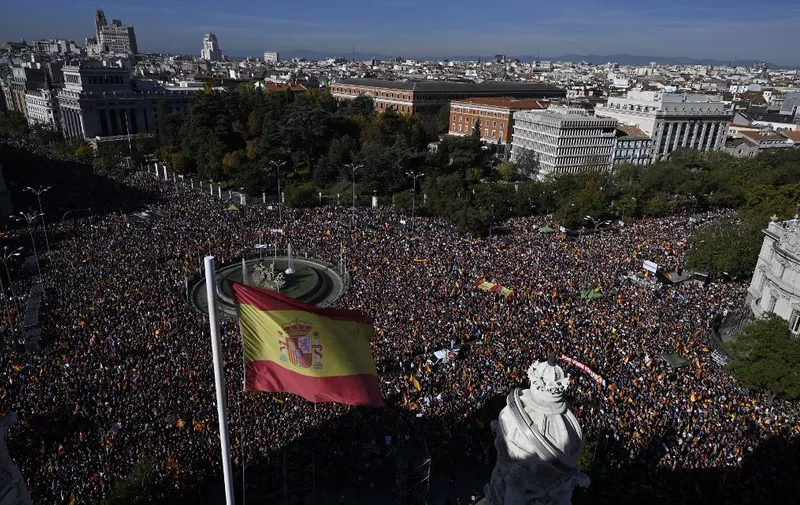 MADRID, SPAIN - NOVEMBER 18: People gather to protest against a bill submitted to Parliament by the Spanish Socialist Workers' Party (PSOE) that would grant amnesty to Catalans in Madrid, Spain on November 18, 2023. Burak Akbulut / Anadolu (Photo by BURAK AKBULUT / ANADOLU / Anadolu via AFP)