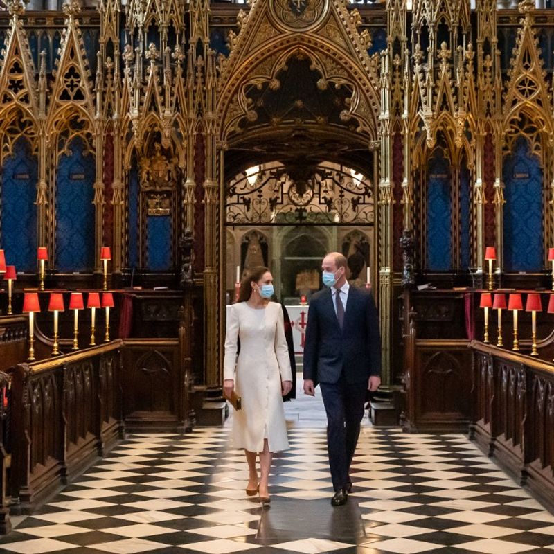 Britain's Prince William, Duke of Cambridge and Britain's Catherine, Duchess of Cambridge visit a coronavirus vaccination centre set up at Westminster Abbey, central London on March 23, 2021, to pay tribute to the efforts of those involved in the Covid-19 vaccine rollout. (Photo by Aaron Chown / POOL / AFP)