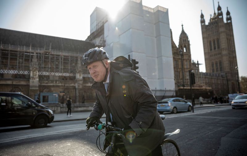 LONDON, ENGLAND - APRIL 01: MP Boris Johnson cycles into Westminster on April 1, 2019 in London, England. MPs in Parliament will vote on alternative arrangements for Brexit in a series of indicative votes tonight after Mrs May's deal was defeated for a third time in the House of Commons last week. (Photo by Dan Kitwood/Getty Images)