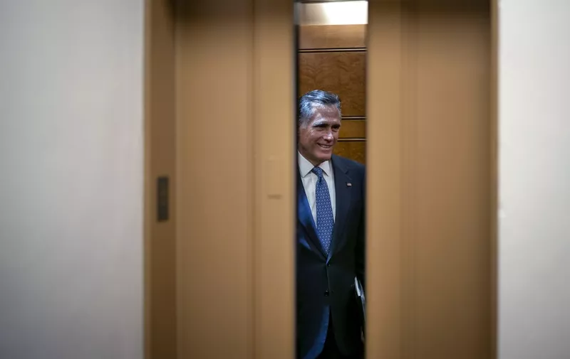 WASHINGTON, DC - JANUARY 23: Sen. Mitt Romney (R-UT) takes an elevator before the impeachment trial of President Donald Trump resumes at the U.S. Capitol on January 23, 2020 in Washington, DC. Democratic House managers will continue their opening arguments on Thursday as the Senate impeachment trial of President Donald Trump continues.   Drew Angerer/Getty Images/AFP