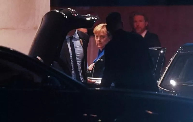 German Chancellor Angela Merkel arrives at the Chancellery for a coalition meeting after she met her Interior minister at the German Christian Democrats (CDU) headquarters in Berlin on July 2, 2018. 
German Chancellor Angela Merkel reached a deal on migration with her rebellious Interior minister, Horst Seehofer, defusing a bitter row that had threatened her government. / AFP PHOTO / dpa / Jörg Carstensen / Germany OUT