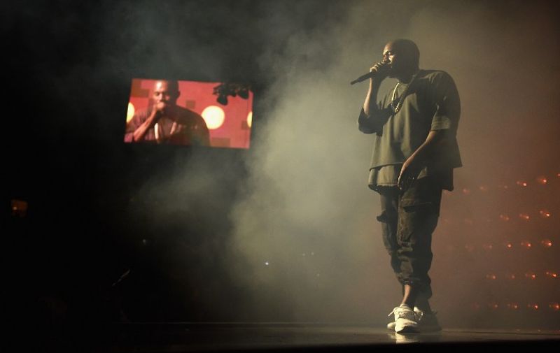 LAS VEGAS, NV - SEPTEMBER 18: Musician Kanye West performs onstage at the 2015 iHeartRadio Music Festival at MGM Grand Garden Arena on September 18, 2015 in Las Vegas, Nevada.   Kevin Winter/Getty Images for iHeartMedia/AFP