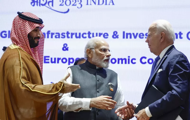 Saudi Arabia's Crown Prince and Prime Minister Mohammed bin Salman (L), India's Prime Minister Narendra Modi (C) and US President Joe Biden attend a session as part of the G20 Leaders' Summit at the Bharat Mandapam in New Delhi on September 9, 2023. (Photo by EVELYN HOCKSTEIN / POOL / AFP)