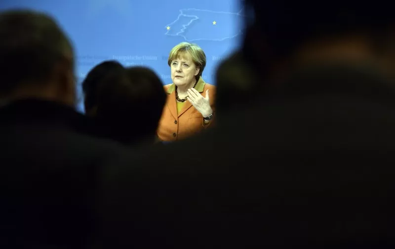German Chancellor Angela Merkel holds a press conference during an EU leaders summit with Turkey on migrants crisis in Brussels on March 7, 2016. 
European Union leaders will on March 7 back closing down the Balkans route used by most migrants to reach Europe, diplomats said, after at least 25 more people drowned trying to cross the Aegean Sea en route to Greece. The declaration drafted by EU ambassadors on March 6 will be announced at a summit in Brussels on March 7, set to also be attended by Turkish Prime Minister Ahmet Davutoglu. / AFP / ALAIN JOCARD