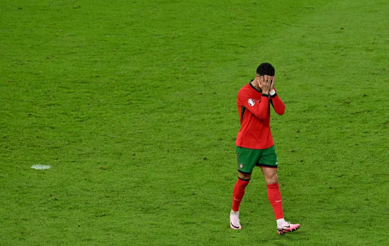 Soccer Football - Euro 2024 - Quarter Final - Portugal v France - Hamburg Volksparkstadion, Hamburg, Germany - July 5, 2024 Portugal's Cristiano Ronaldo looks dejected after missing a chance to score REUTERS/Annegret Hilse     TPX IMAGES OF THE DAY