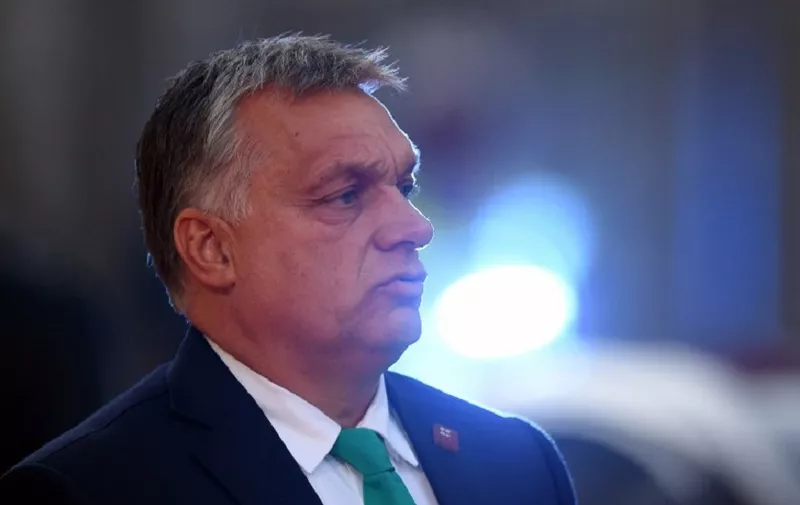 Hungarian Prime Minister Viktor Orban speaks to journalists as he arrives at the Felsenreitschule prior to their informal dinner as part of the EU Informal Summit of Heads of State or Government in Salzburg, Austria on September 19, 2018. (Photo by Christof STACHE / AFP)