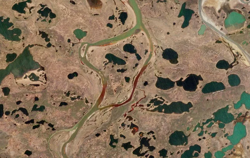 A handout photo made available by 2020 Planet Labs on June 5, 2020 shows an aerial view of the large diesel spill in the Ambarnaya River outside Norilsk in the Arctic taken on June 4. - Russia has managed to contain a massive diesel spill into a river in the Arctic, a spokeswoman for the emergencies ministry told AFP on June 5, 2020. Environmentalists said the oil spill, which took place last May 29, was the worst such accident ever in the Arctic region. (Photo by - / Planet Labs Inc. / AFP) / RESTRICTED TO EDITORIAL USE - MANDATORY CREDIT "AFP PHOTO / © 2020 Planet Labs Inc" - NO MARKETING - NO ADVERTISING CAMPAIGNS - DISTRIBUTED AS A SERVICE TO CLIENTS