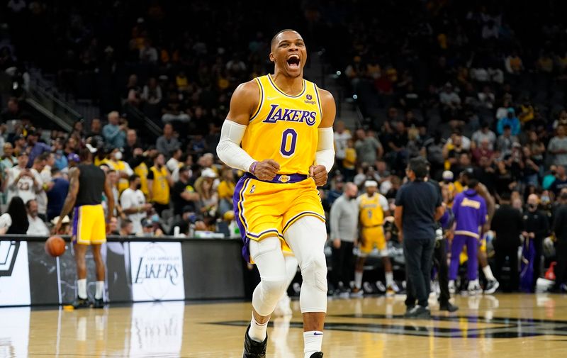Oct 26, 2021; San Antonio, Texas, USA; Los Angeles Lakers guard Russell Westbrook (0) runs across the court to get pumped up before the game against the San Antonio Spurs at AT&amp;T Center. Mandatory Credit: Scott Wachter-USA TODAY Sports