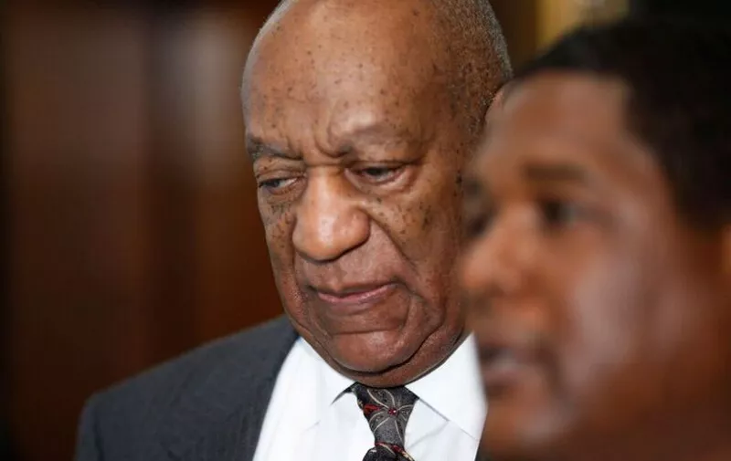 Comedian Bill Cosby, is seen at the Montgomery County Courthouse after a preliminary hearing related to assault charges, May 24, 2016, in Norristown, Pennsylvania.
Disgraced television legend Bill Cosby will face trial over accusations that he sexually assaulted a woman after plying her with drugs at his Philadelphia home 12 years ago, a judge ruled Tuesday.The 78-year-old pioneering black comedian looked subdued and kept his glance averted from onlookers as he left a county court house in Pennsylvania, dressed in a grey suit and floral tie, leaning on a member of his entourage.
 / AFP PHOTO / POOL / DOMINICK REUTER