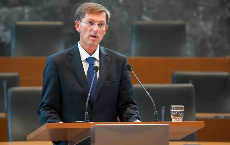 Newly appointed Slovenian Prime Minister Miro Cerar takes the oath of office in Ljubljana on August 25, 2014. Slovenia's parliament designated the winner of last month's election, political newcomer Miro Cerar, as the troubled eurozone country's new prime minister and asked him to form a new government. AFP PHOTO / JURE MAKOVEC
