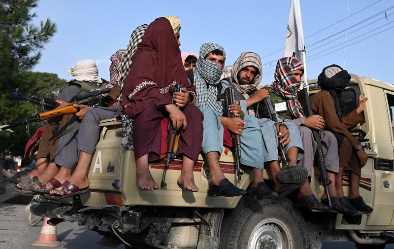 (FILES) In this file photo taken on August 23, 2021 Taliban fighters in a vehicle patrol the streets of Kabul as in the capital, the Taliban have enforced some sense of calm in a city long marred by violent crime, with their armed forces patrolling the streets and manning checkpoints. - When Al-Qaeda hijackers killed nearly 3,000 people on September 11, 2001, the United States instantly took on a new mission as a furious and fearful nation coalesced around president George W. Bush's "war on terrorism" that would obliterate the rest of the international agenda.
Twenty years later, the world has transformed. An all-consuming focus on terrorism has given way to a weariness about "forever wars"; days before the September 11 anniversary, Taliban militants who had been swiftly defeated after the 2001 attacks seized back power in Afghanistan amid a US withdrawal. (Photo by Wakil KOHSAR / AFP)