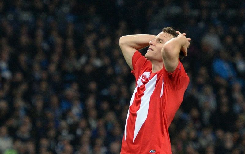 Sevilla's French forward Kevin Gameiro reacts after missing a header during a UEFA Champions league Group D football match between Manchester City and Sevilla at the Etihad Stadium in Manchester, north west England on October 21, 2015.       AFP PHOTO / OLI SCARFF