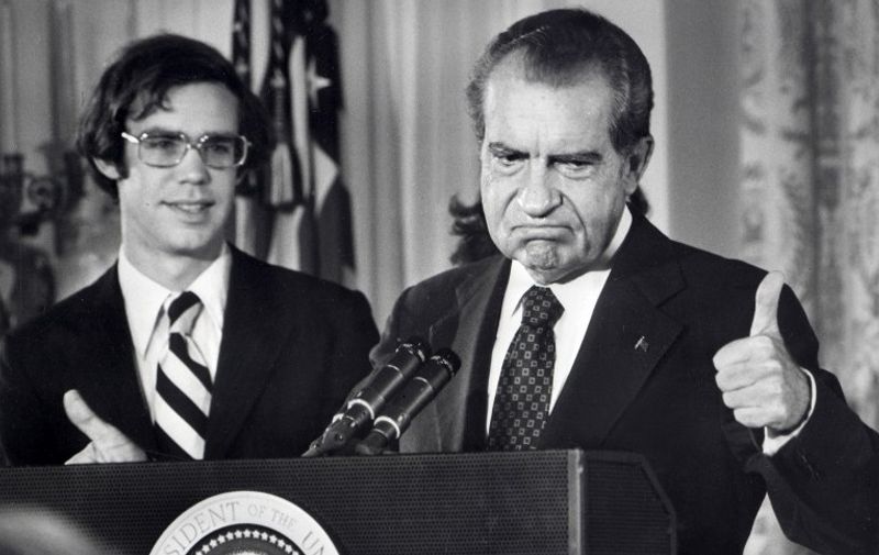 File photo dated 09 August 1974 of the 37th President of the United States, Richard Nixon, as he bids farewell to the White House staff. At left is his son-in-law David Eisenhower (US President Dwight Eisenhower's grandson) who is married to his daughter Julie, hidden behind the President. / AFP PHOTO / AFP FILES