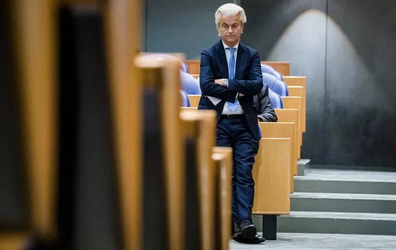 Far-right PVV party leader Geert Wilders attends a parliamentary debate about high inflation and its compensation in The Hague on November 1, 2022. (Photo by Bart Maat / ANP / AFP) / Netherlands OUT