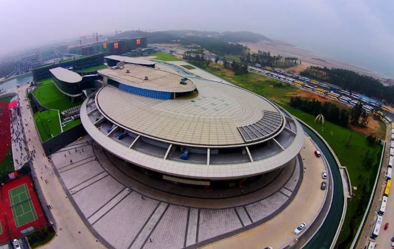 TOPSHOTS This photo taken on May 16, 2015 shows the NetDragon Websoft headquarters building with the iconic circular contours and tubular features of the USS Enterprise, from the US television and film series Star Trek, in Fuzhou, in eastern China&#8217;s Fujian province. A Chinese millionaire and self-confessed Star Trek fan has boldly gone where no [&hellip;]