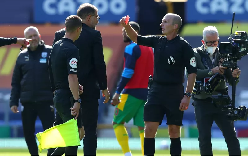 LIVERPOOL, ENGLAND - SEPTEMBER 19: Slaven Bilic, Manager of West Bromwich Albion  is shown the red card by match referee Mike Dean during the Premier League match between Everton and West Bromwich Albion at Goodison Park on September 19, 2020 in Liverpool, England. (Photo by Alex Livesey/Getty Images)