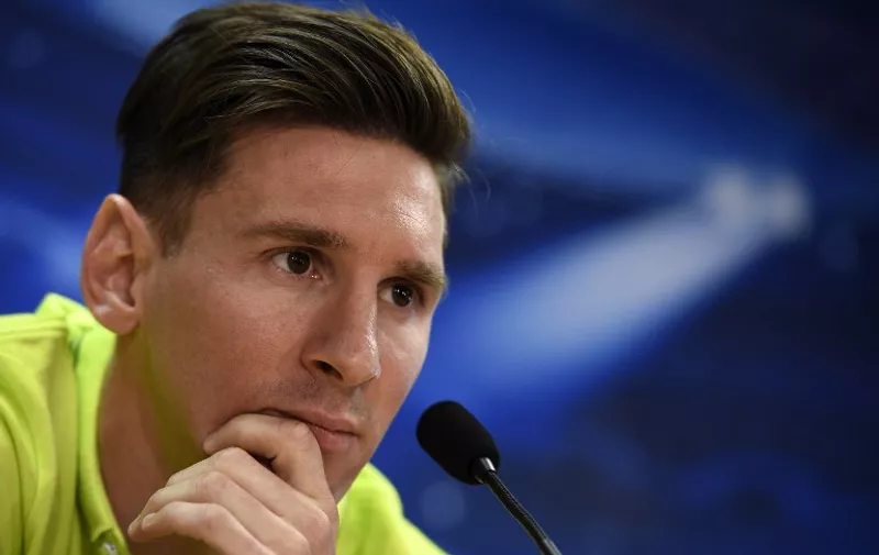 Barcelona's Argentinian forward Lionel Messi looks on during a press conference at the Sports Center FC Barcelona Joan Gamper in Sant Joan Despi, near Barcelona on April 5, 2015, on the eve of the UEFA Champions League semi-final first leg football match between FC Barcelona and FC Bayern Munich.   AFP PHOTO/ LLUIS GENE