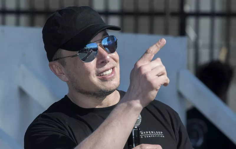 SpaceX chief Elon Musk answers questions after the 2019 SpaceX Hyperloop Pod competition at the SpaceX headquarters in Los Angeles on July 21, 2019. - 21 teams from around the world competed in the event which sees their pods race on the 1.25 kilometer Hyperloop test track. (Photo by Mark RALSTON / AFP)