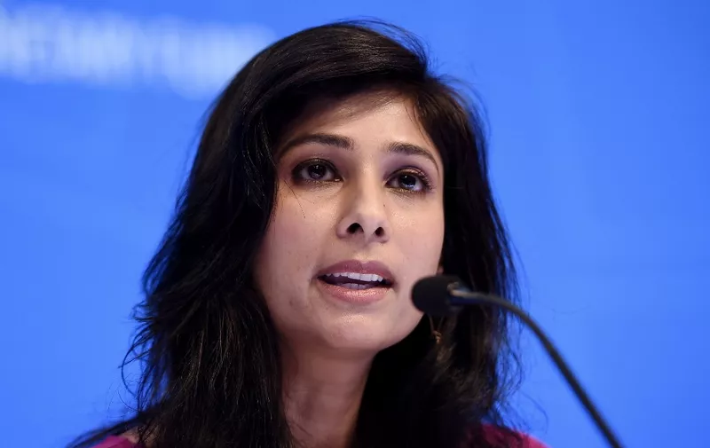 (FILES) In this file photo Gita Gopinath, IMF Chief Economist and Director of the Research Department, speaks at a briefing  during the IMF and  World Bank Fall Meetings on October 15, 2019 in Washington, DC. - Governments should deploy "substantial" stimulus and international coordination to counteract the economic impact of the spreading coronavirus epidemic, the International Monetary Fund's chief economist said on March 9, 2020. Given the "acute shocks" caused to economies, consumers and businesses, Gita Gopinath said "policymakers will need to implement substantial targeted fiscal, monetary and financial market measures to help affected households and businesses." (Photo by Olivier Douliery / AFP)
