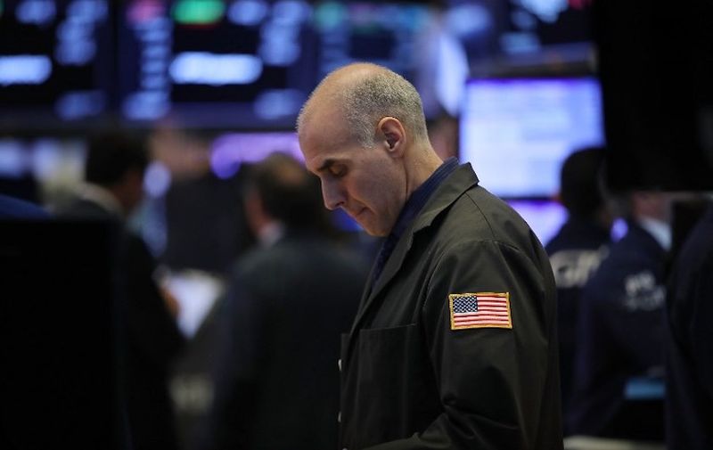 NEW YORK, NY - FEBRUARY 06: Traders work on the floor of the New York Stock Exchange (NYSE) on February 6, 2018 in New York City. Following Monday's over 1000 point drop, the Dow Jones Industrial Average briefly fell over 500 points in morning trading.   Spencer Platt/Getty Images/AFP
