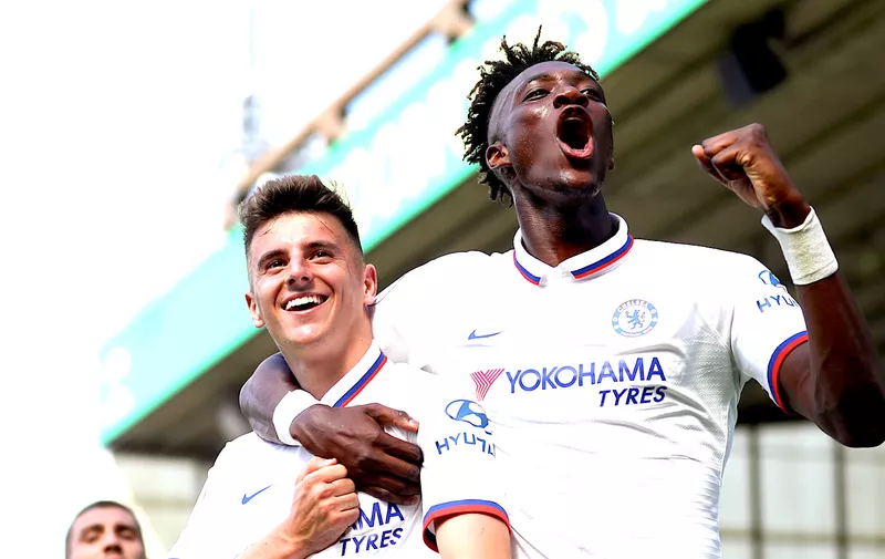 NORWICH, ENGLAND - AUGUST 24: Mason Mount and Tammy Abraham of Chelsea celebrates after scoring their team's second goal during the Premier League match between Norwich City and Chelsea FC at Carrow Road on August 24, 2019 in Norwich, United Kingdom. (Photo by Catherine Ivill/Getty Images)