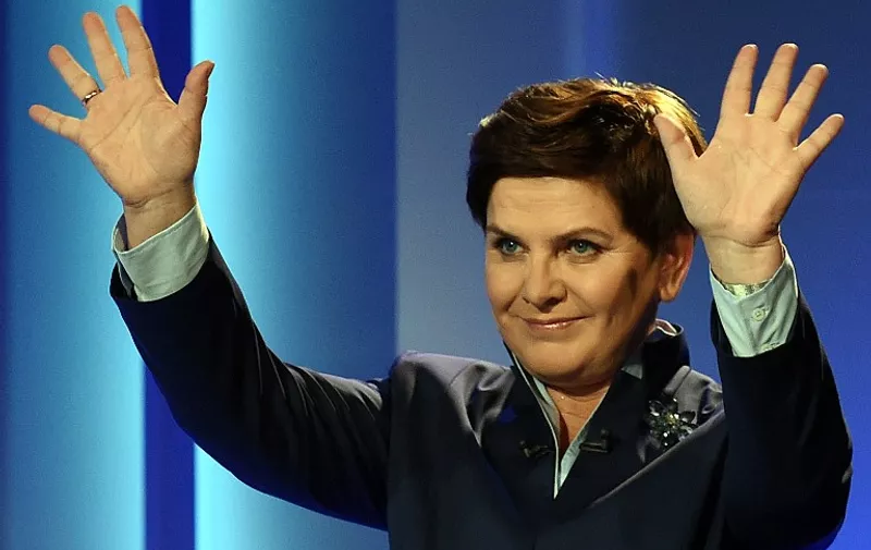Poland's main opposition Law and Justice party (PiS) candidate for the prime minister's post, Beata Szydlo gestures before a TV debate in  Warsaw on October 20, 2015. Parliamentary elections in Poland will take place on October  25, with current opposition party, the conservative Law and Justice leading in polls.AFP PHOTO/JANEK SKARZYNSKI